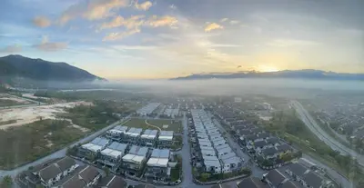 an aerial view of a city in the fog at Residensi Meru Raya in Ipoh