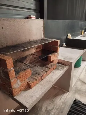 a stack of bricks sitting on top of a counter at Homestay 39 Private Pool Perak in Tanjung Rambutan