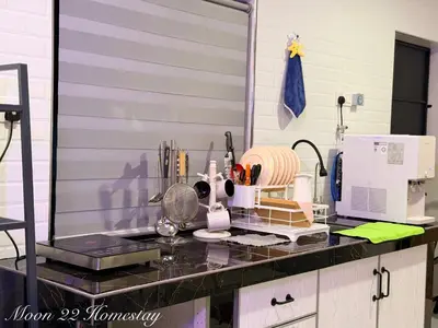 a kitchen counter with a appliance on top of it at Moon22 Private Pool in Ipoh