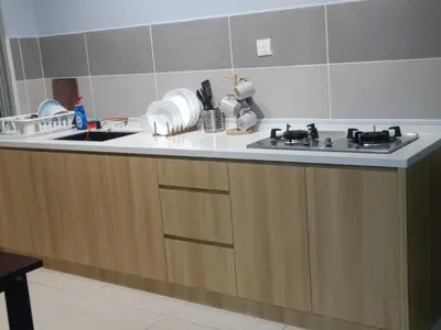 a kitchen with a sink and a counter top at Homestay D'sasz Meru Ipoh in Ipoh