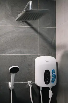 a soap dispenser on a wall in a bathroom at Seaview Infinity Pool 2BR 2CP 8Pax Urban Suite 251 in George Town