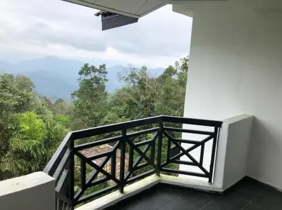 a balcony with a view of the mountains at Misty at Fraser's Hill in Bukit Fraser