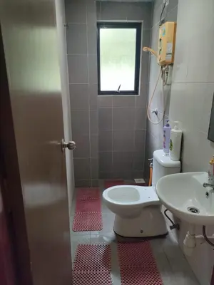 a small bathroom with a toilet and a sink at Pangkor Shu Yuan \u90a6\u54af\u5c9b\u5885\u82d1\u6d77\u6ee9\u522b\u5885 in Pangkor