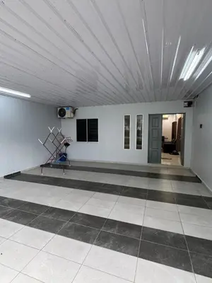 an empty room with a room with a ceiling at Wika Homestay in Kulim
