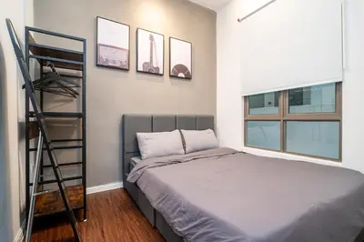 a bedroom with a bunk bed and a ladder at Serene Industrial Family Retreat 2-7pax &Sunrise view in Brinchang