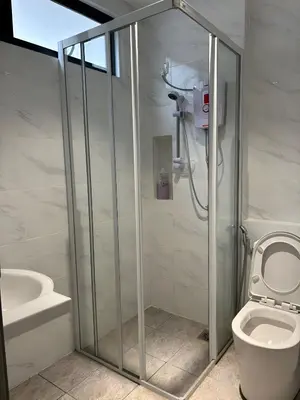 a shower stall in a bathroom with a toilet at Serene Terrace House 2-12pax &Sunrise View in Brinchang