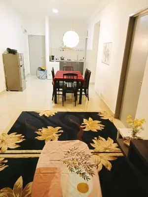 a dining room with a table with a red table cloth at Palas Horizon Cameron Highland in Brinchang