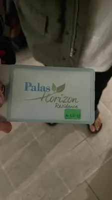 a person holding a sign that says pales carboninatorinator at Palas Horizon Cameron Highland in Brinchang