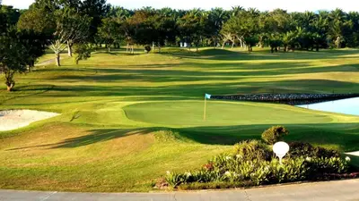 a view of a golf course with a green at Homestay Tasnim Bertam 5 Rooms Corner lot in Kepala Batas