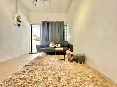 a living room with a couch and a table at Cozy10perwira#6pax#Netflix#neariconcity&iconicpoint in Simpang Ampat