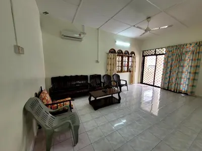 a living room with a couch and chairs at Pangkor Homestay in Pangkor