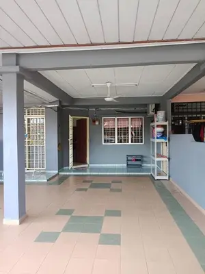 a large empty room with a blue wall at Airis Homestay Bertam Perdana in Kepala Batas