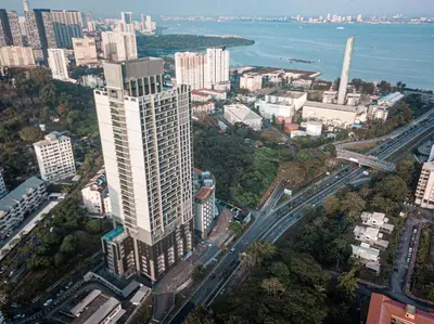 an aerial view of a tall building in a city at Break & Stay formerly known as BreakX Hotel in George Town