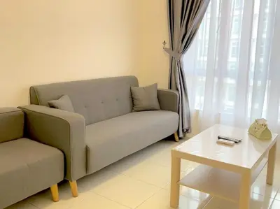 a living room with a couch and a coffee table at Anderson Ipoh Blissful Homestay in Ipoh