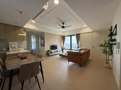 a living room with a table and a dining room at Macalister Suite - 2 Bedrooms in George Town