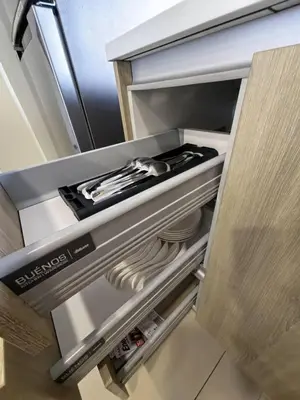 an empty refrigerator with its door open at Macalister Suite - 2 bedrooms in Kampong Makam