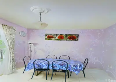 a dining room with a blue table and chairs at COZY Home Terrace - 1km to Water Theme Park Tambun Ipoh in Ipoh