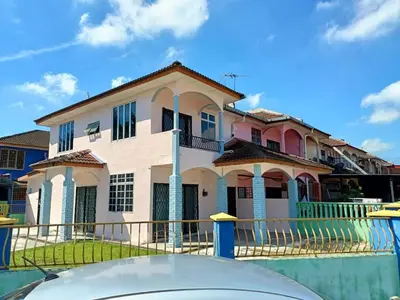 a house with a swimming pool in front of a house at Homestay Jannati Bandar Baru Putra Ipoh in Ipoh