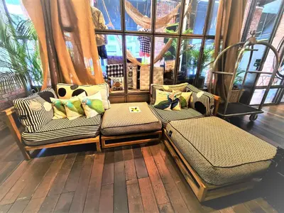a room with two couches in front of a window at M Boutique Hotel Station 18 - Ipoh in Ipoh