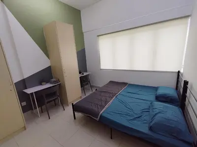 a bedroom with a bed and a large window at Kampar Lake House - Bandar Baru Kampar City Centre in Kampar