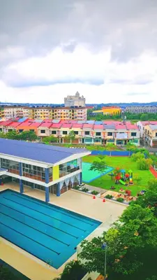 an overhead view of a school building with a playground at Kampar Lake House - Bandar Baru Kampar City Centre in Kampar