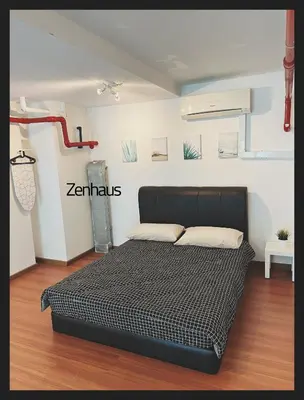 a bedroom with a bed in a room at THE CEO LOFT by Zenhaus in Bayan Lepas