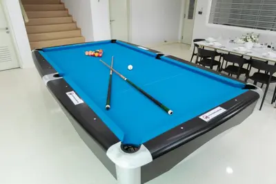 a pool table in the middle of a room at GeorgeTown Codrington 6BR KTV BBQ Pool Bungalow 28Pax in George Town