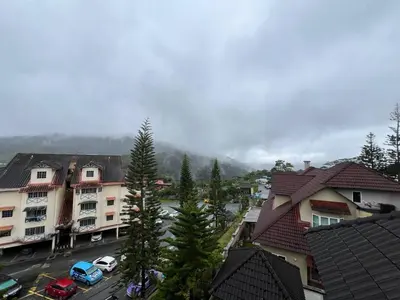 an aerial view of a city with buildings and cars at Cottage Hill -Cameron Highlands in Cameron Highlands