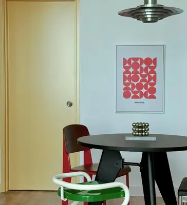 a dining room with a table and chairs at Haus in George Town