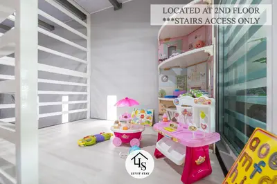 a childs room with a table and a shelf at IPOH CAIP TownHouse UpperUnit 4R3B Ipoh Tambun 10Pax by Luvit Stay in Ipoh