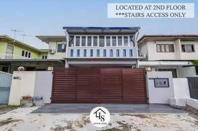 a house with a wooden gate in front of it at IPOH CAIP TownHouse UpperUnit 4R3B Ipoh Tambun 10Pax by Luvit Stay in Ipoh