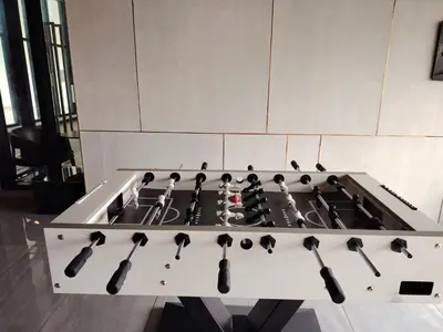 a kitchen with a stove top with cooking utensils at a29 seaview luxury 3BR-10PAX URBAN NETFLIX in Jelutong