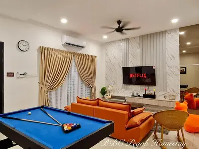 a living room with a pool table in it at BBC Pegoh in Ipoh