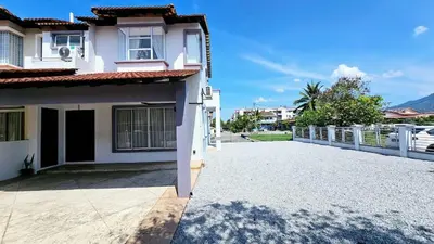 a white house with a large driveway at Cozy living 2 Storey Haus 4Room10Pax-Near Icon City in Bukit Mertajam