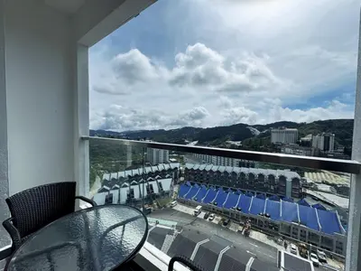 a view of a balcony with a table and chairs at 180View of Keafarm 7-9Pax CoolSummer at Palas Horizon in Tanah Rata