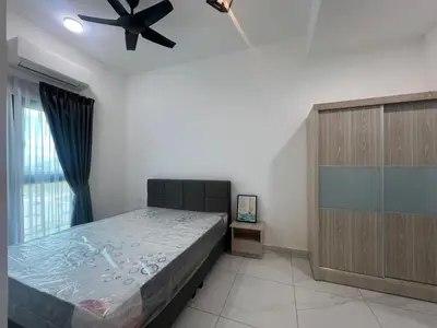 a bedroom with a bed and a ceiling fan at Di Aran Residence Penang in Simpang Ampat