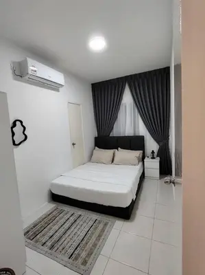 a white bedroom with a bed and a window at AzzSpacesAnderson in Ipoh