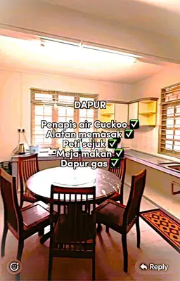 a dining room with a table and chairs and words on the wall at D' Gerik Homestay Taman Sinaran in Gerik