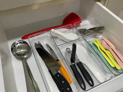 a drawer filled with utensils in a drawerasteryasteryasteryasteryasteryastery at CozyNest Homestay The venus Sitiawan Sing & Play in Seri Manjung