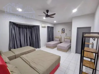 a bedroom with two beds and a ceiling fan at Royale Villa Private Pool Batu Gajah Ipoh Perak in Batu Gajah