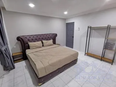 a bedroom with a large bed in a room at Royale Villa Private Pool Batu Gajah Ipoh Perak in Batu Gajah