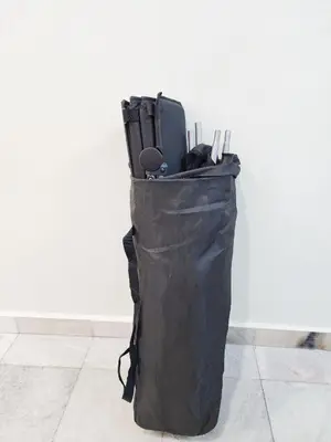 a black bag sitting on the floor next to a wall at Ipoh 168 Taman Pelangi, Persiaran Halaman Ampang Ipoh Homestay in Ipoh