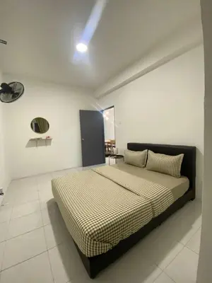 a bedroom with a large bed in a room at Daddy Homes3 Emerald Centrum Brinchang Cameron Highlands sunset view in Brinchang
