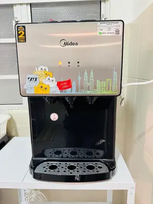 a machine with drawings on the top of it on a shelf at Daddy Homes3 Emerald Centrum Brinchang Cameron Highlands sunset view in Brinchang