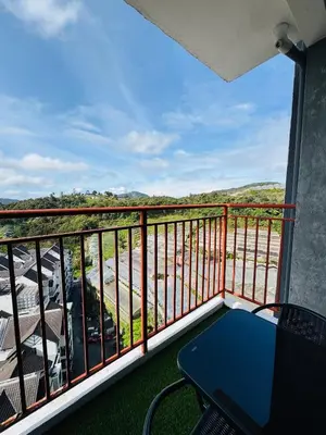 a balcony with a view of a parking lot at Daddy Homes3 Emerald Centrum Brinchang Cameron Highlands sunset view in Brinchang