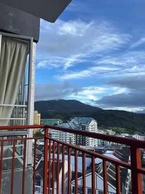 a balcony with a view of a city at Daddy Homes3 Emerald Centrum Brinchang Cameron Highlands sunset view in Brinchang