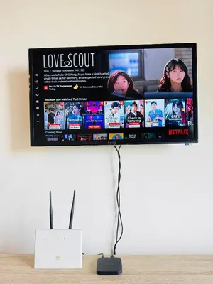 a flat screen tv hanging on a wall at Daddy Homes3 Emerald Centrum Brinchang Cameron Highlands sunset view in Brinchang