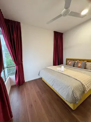 a bedroom with a bed with red curtains and a window at 180view TopHill Keafarm 7-9Pax #Cool Summer Cameron in Brinchang
