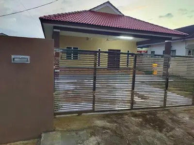 a fence in front of a house at DeStay Taiping in Taiping