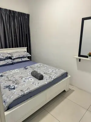 a small bedroom with a bed with a mattress at AYAAN BLOOM BUDGET HOMESTAY FREE WiFi & Netflix in Cameron Highlands